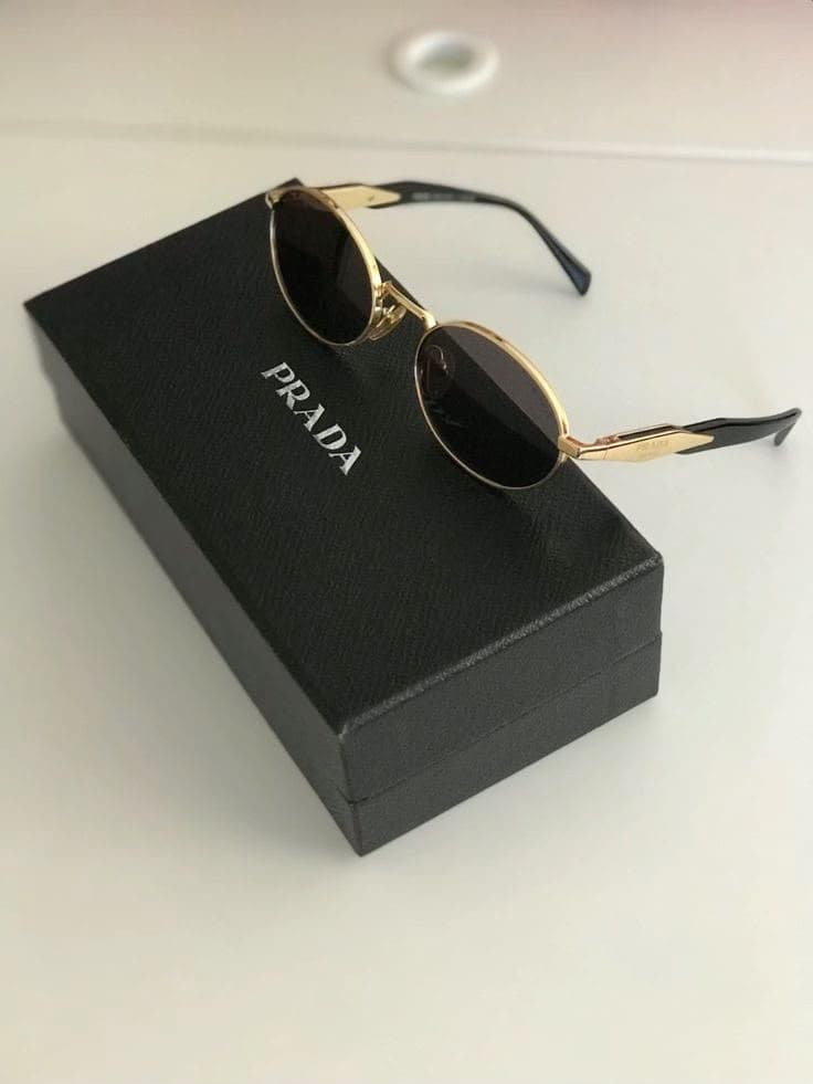 Gold oval sunglasses